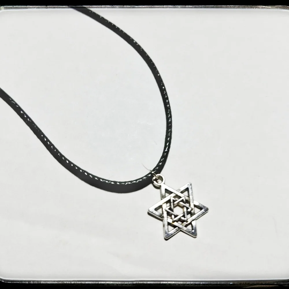 Silver Tone Star with Black Cord Necklace